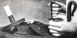 old photo showing hand with firesteel