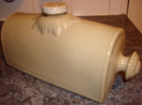 pottery hot water bottle with stopper and carrying handle