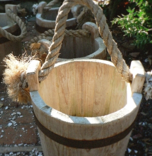 wooden bucket, rope handle, metal bands